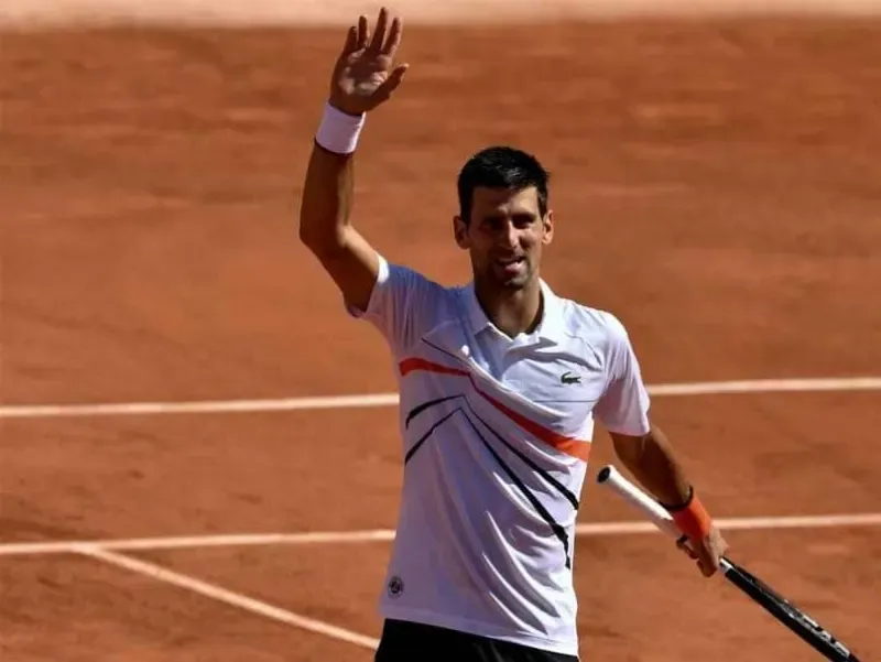 Djokovic cruises into last 16