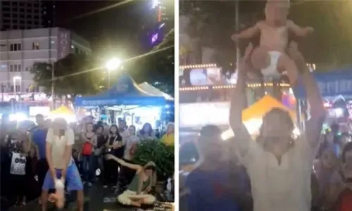 Police detain busking couple for ‘abusing’ baby