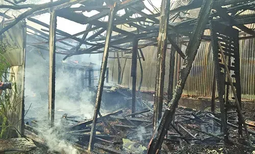 Fire erupts in carpentry workshop