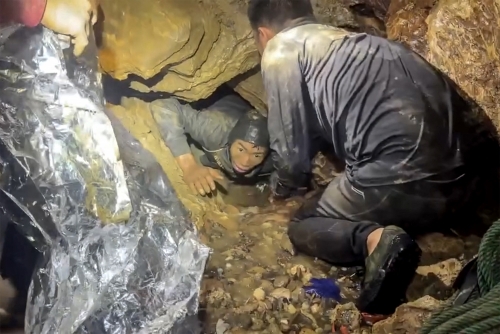 4 more miners rescued from flooded Laos cave after 10-day ordeal 4 more miners rescued from flooded Laos cave after 10-day ordeal
