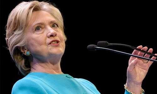 Clinton faces FBI probe as race enters final 10 days