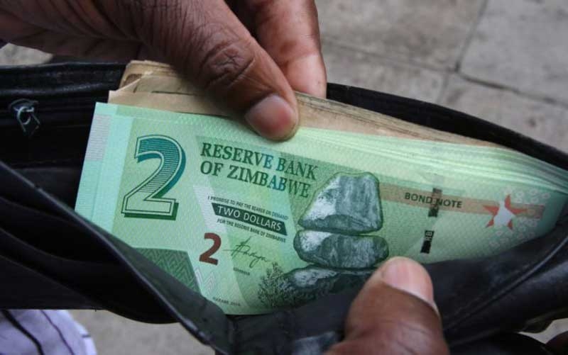 Zimbabwe president promises new currency Zimbabwe president promises new currency