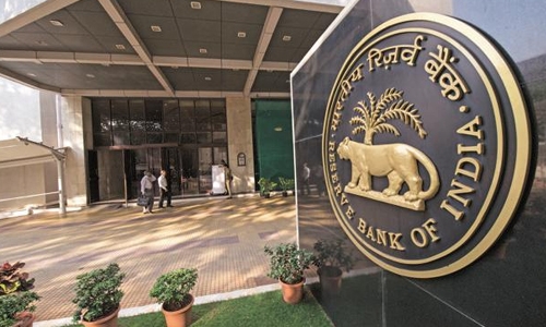 India’s rupee hits new low as RBI holds rates