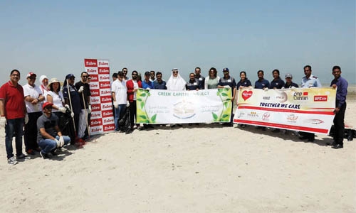 Volunteers remove piles of trash in beach cleanup Volunteers remove piles of trash in beach cleanup