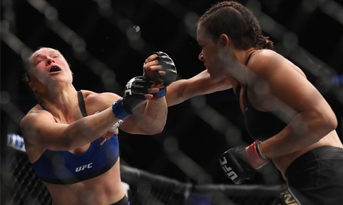 Brazil's Nunes pummels Rousey in UFC title fight Brazil's Nunes pummels Rousey in UFC title fight