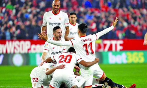 Sevilla gets past Atletico in quarters Sevilla gets past Atletico in quarters