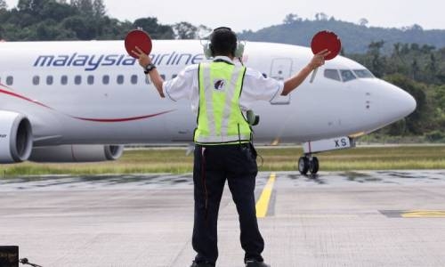 Malaysia to reopen borders from April with quarantine waiver