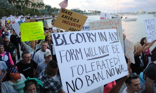 At least 2,000 march on Trump's Florida resort At least 2,000 march on Trump's Florida resort