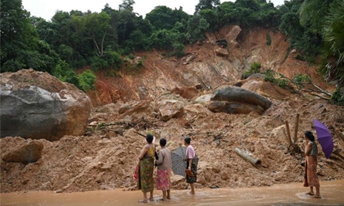 Tens of thousands flee homes in flood-hit Myanmar as landslide toll hits 59