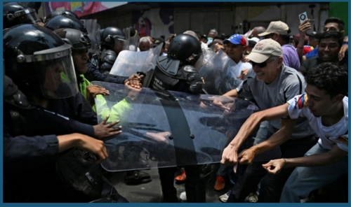 Venezuelan Police Use Tear Gas Against Protesters Demanding Higher Wages Venezuelan Police Use Tear Gas Against Protesters Demanding Higher Wages