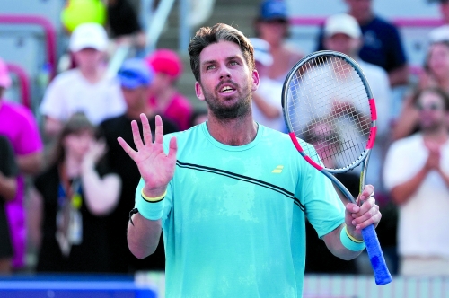 Battling Norrie survives match point to oust de Minaur