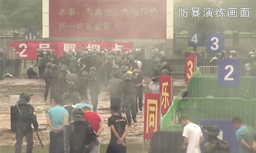 China warns protesters with slick military video China warns protesters with slick military video