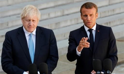 Macron backs further Brexit talks as British Prime Minister visits