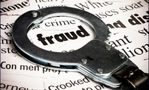 Bahrain court lowers jail term for fraud accused