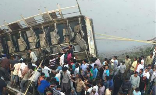 37 dead in India after bus plunges into river