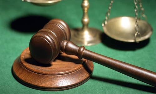 Son charged in killing of US Navy staff member in Bahrain