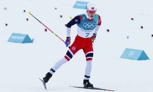 Kruger bags skiathlon gold