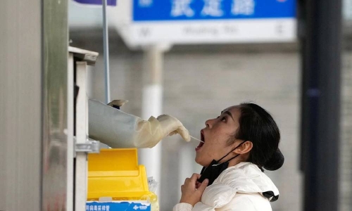 China rolls back strict COVID-19 rules after historic protests