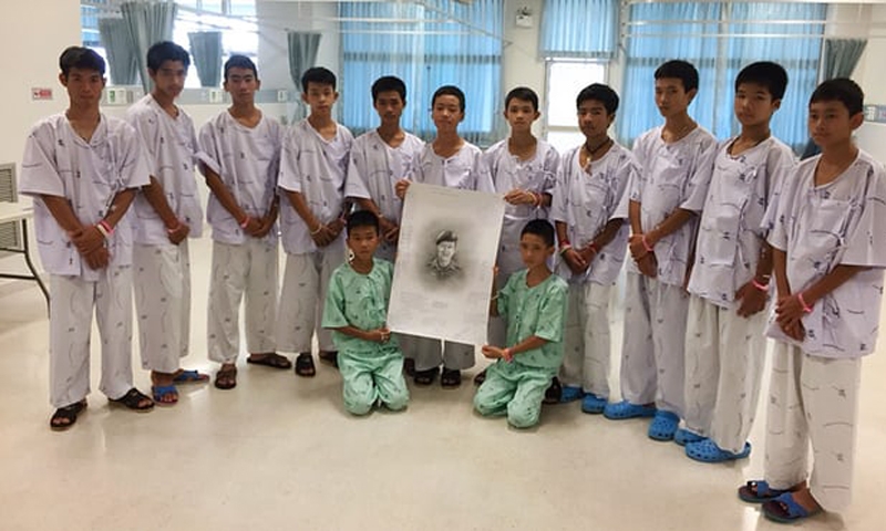 Thai boys rescued from cave mourn diver who died during rescue