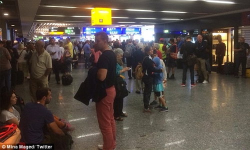 Woman 'carrying a bomb runs through security and crowd' at Frankfurt Airport 