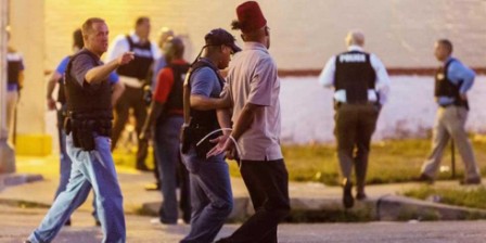 US police tear gas protesters after officers kill black man US police tear gas protesters after officers kill black man