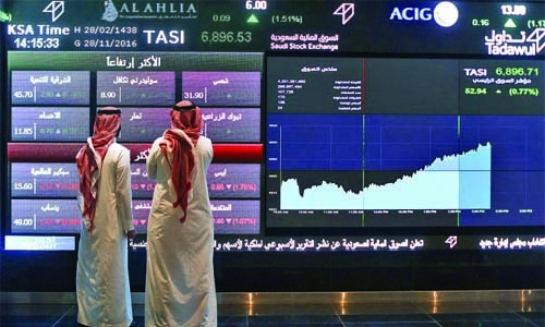 Gulf stocks mostly rise on oil surge