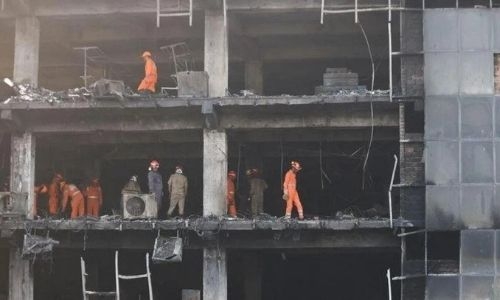 Building fire kills 27 in India capital, police arrest company owners