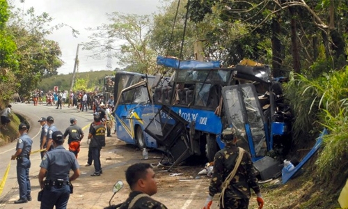 Philippine bus crash kills 13 students on camping trip, driver