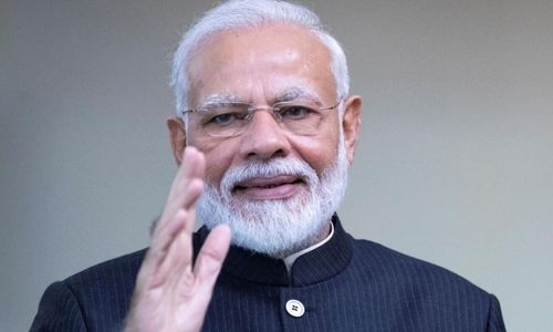 India PM Modi releases postal stamp in honour of migrant workers India PM Modi releases postal stamp in honour of migrant workers