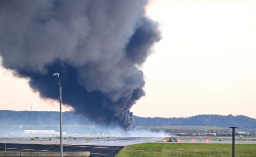 At least 9 dead after cargo plane crashes near Louisville airport At least 9 dead after cargo plane crashes near Louisville airport