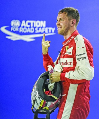 Vettel stuns Hamilton with Singapore pole