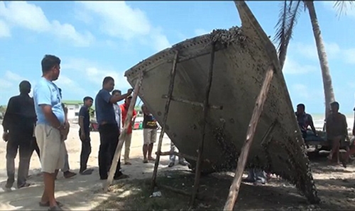 Suspected MH370 'plane debris' washed up on Thailand beach