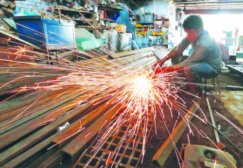 India’s factory growth improves slightly in January, PMI shows 