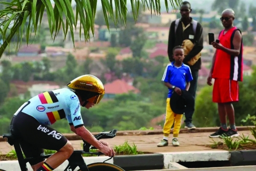 Evenepoel wins third straight time-trial cycling world title 
