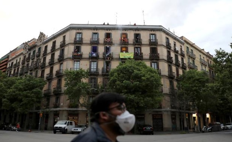 Spain's coronavirus deaths surpass 20,000 but daily increase slows