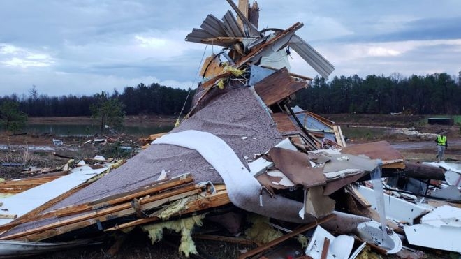 US storms: At least 11 killed as severe weather hits south US storms: At least 11 killed as severe weather hits south