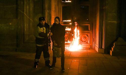 Russia detains artist who set fire to security service HQ