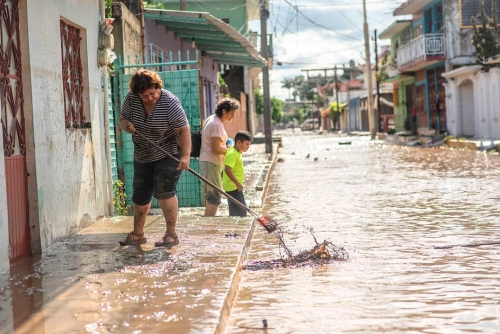 64 left dead in Mexico floods 64 left dead in Mexico floods