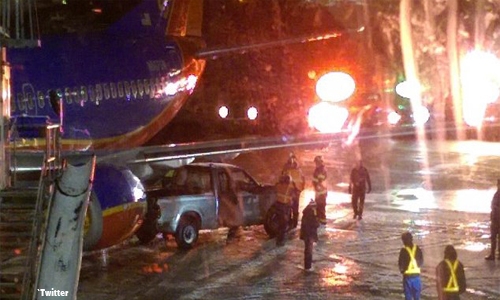 Pickup truck hits plane at airport Pickup truck hits plane at airport