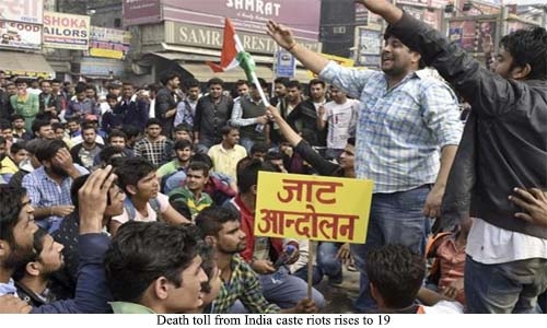 Death toll from India caste riots rises to 19 Death toll from India caste riots rises to 19