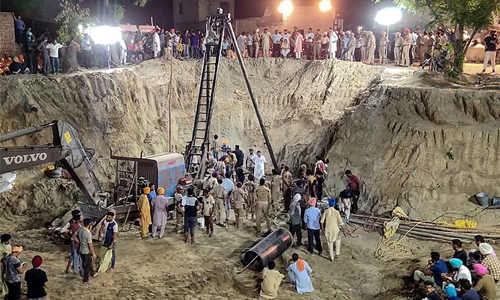 Two-year-old Indian boy dies after four days down well Two-year-old Indian boy dies after four days down well