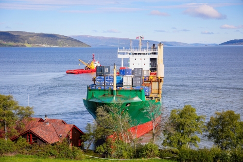 Norway cabin owner snoozes as cargo ship runs aground outside