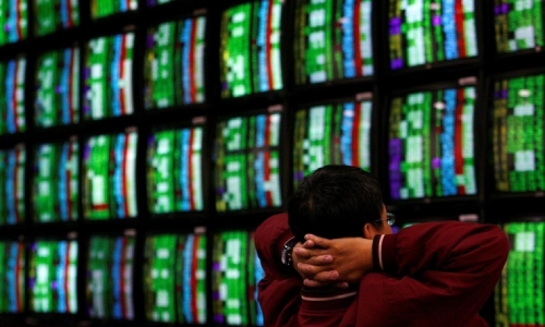 Asian shares mixed as investors digest U.S. inflation surge