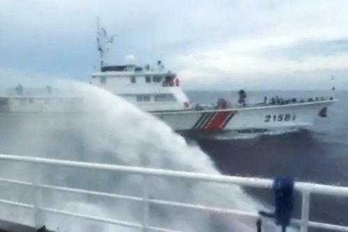 China fires water cannon at Philippine vessels near Scarborough Shoal China fires water cannon at Philippine vessels near Scarborough Shoal