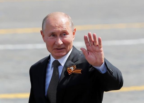 Putin reviews Russian military might as tensions with West soar  