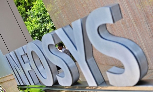 India's Infosys shares plunge as sales outlook cut