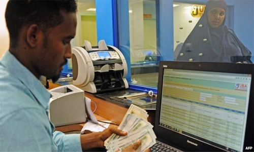 Saudi ministry says no remittance fees on expat workers 