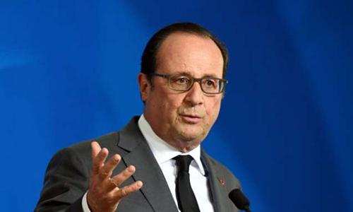 France urges climate talks progress, Hollande downbeat
