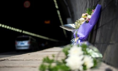 China says arson behind deadly school bus fire China says arson behind deadly school bus fire