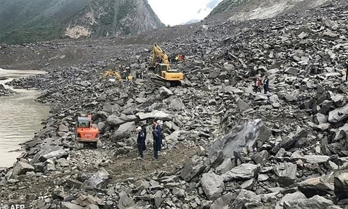 Landslide in southwest China kills eight, 17 missing